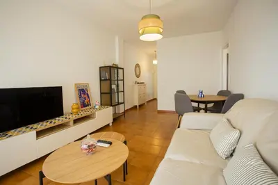 Una televisión o centro de entretenimiento en Wish Suite Bulería Sevilla