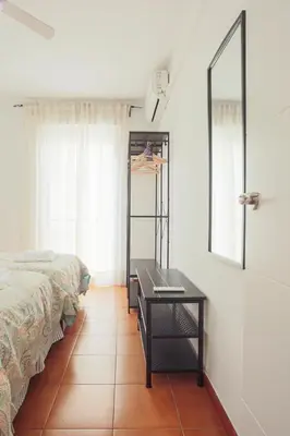 Cama o camas de una habitación en Wish Suite Bulería Sevilla