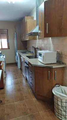 Una cocina o zona de cocina en Complejo Turístico Fuenmayor