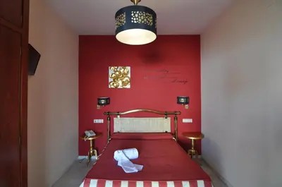 Cama o camas de una habitación en Hostal la Fuente
