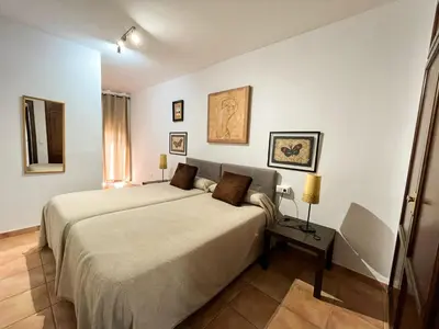 Cama o camas de una habitación en Apartamentos Villa Torcal