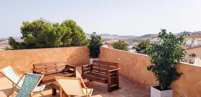 Un balcón o terraza de Apartamentos Villa Torcal