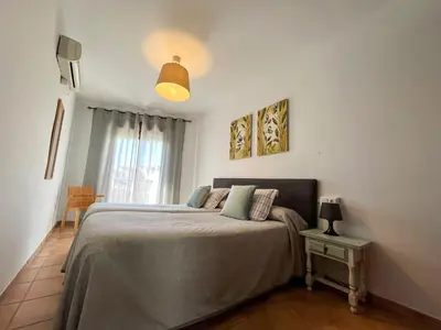 Cama o camas de una habitación en Apartamentos Villa Torcal