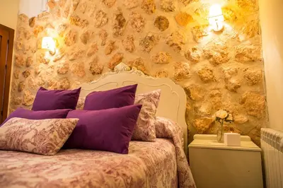 Cama o camas de una habitación en Hotel Rural Sisapo