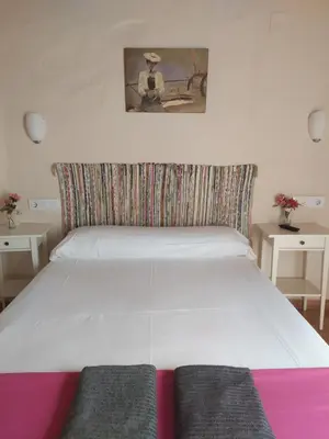 Cama o camas de una habitación en Pension Azahar