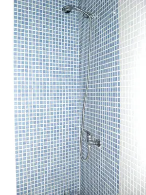 Un baño de Divi Apartments Valvanera
