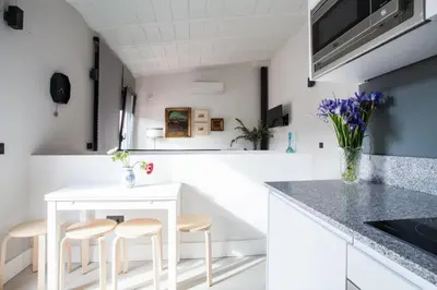 Una cocina o zona de cocina en Apartamentos RG Dúplex San Bernardo