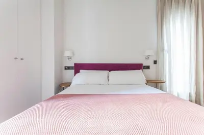 Cama o camas de una habitación en Apartamentos RG Dúplex San Bernardo