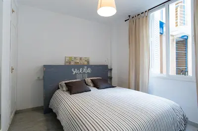 Cama o camas de una habitación en LR Parking incluido ubicacion central