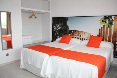 Cama o camas de una habitación en Hacienda Guadalquivir