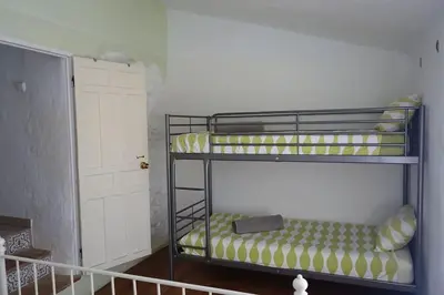 Cama o camas de una habitación en Olive Branch El Chorro