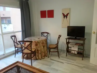 Una televisión o centro de entretenimiento en Apartamento Buhaira
