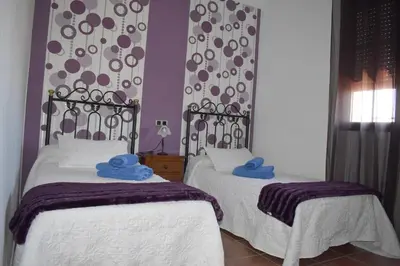 Cama o camas de una habitación en La Villa del Lago
