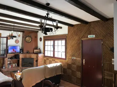 Una televisión o centro de entretenimiento en La Villa del Lago