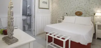 Cama o camas de una habitación en Basic Hotel Puerta de Sevilla
