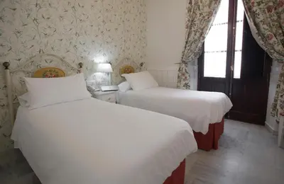 Cama o camas de una habitación en Basic Hotel Puerta de Sevilla