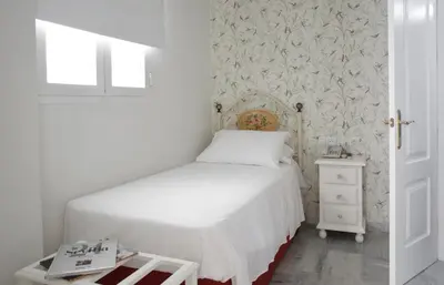 Cama o camas de una habitación en Basic Hotel Puerta de Sevilla