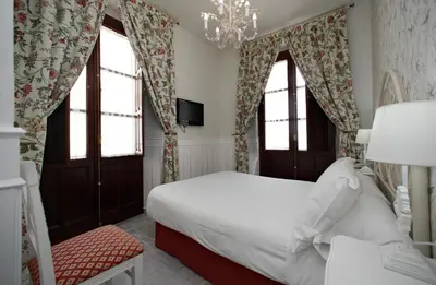 Cama o camas de una habitación en Basic Hotel Puerta de Sevilla