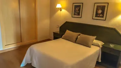 Cama o camas de una habitación en Hotel Salvador