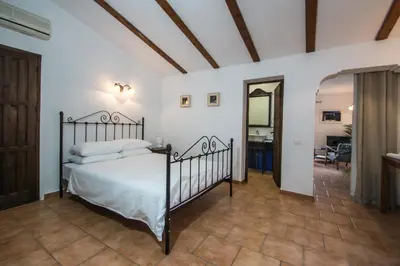 Cama o camas de una habitación en La Finca Blanca