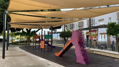 Zona de juegos infantil en Ático Guadalhorce - Mirador privado con barbacoa y solárium
