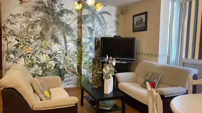 Una televisión o centro de entretenimiento en Ático Guadalhorce - Mirador privado con barbacoa y solárium