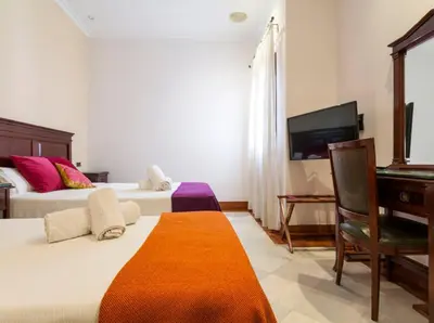 Cama o camas de una habitación en Hotel Baco