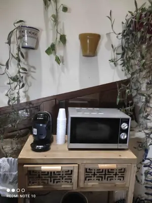 Una cocina o zona de cocina en Hostal Puerta Carmona