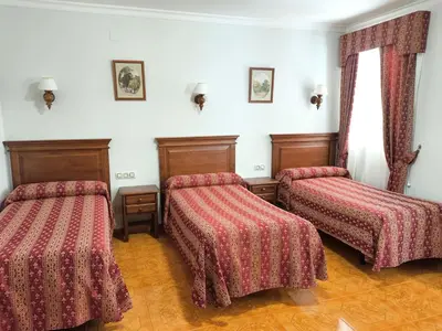 Cama o camas de una habitación en Hostal Bellido