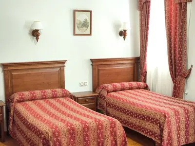 Cama o camas de una habitación en Hostal Bellido