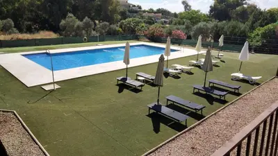 Piscina en o cerca de Apartamentos Turísticos La Castilleja