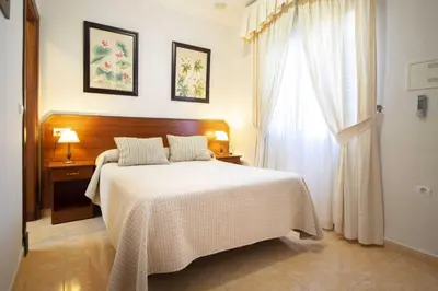 Cama o camas de una habitación en Los Gallos