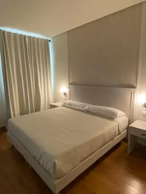Cama o camas de una habitación en Hotel Santa Ana