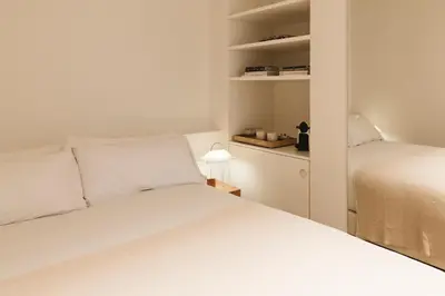 Cama o camas de una habitación en Casa Teva Rooms Sevilla
