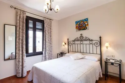 Cama o camas de una habitación en Hotel Palacio del Intendente