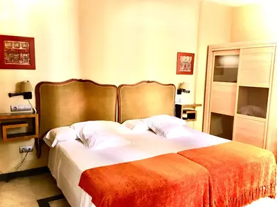 Cama o camas de una habitación en Hotel Conde de Cárdenas