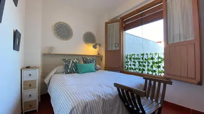 Cama o camas de una habitación en Hostel Plaza Mayor Corredera