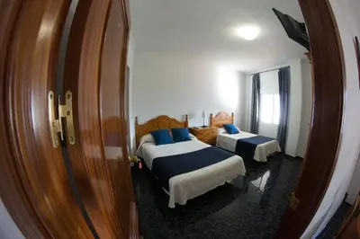 Cama o camas de una habitación en Hostal Caminito del Rey