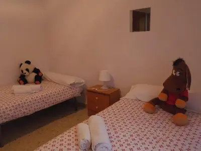 Cama o camas de una habitación en Céntrico Donkey Parking