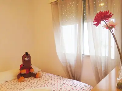 Cama o camas de una habitación en Céntrico Donkey Parking