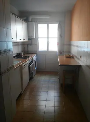 Una cocina o zona de cocina en Céntrico Donkey Parking