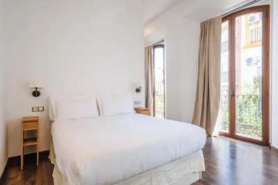 Cama o camas de una habitación en Apartamentos 