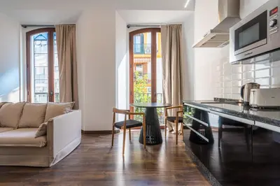Una cocina o zona de cocina en Apartamentos 
