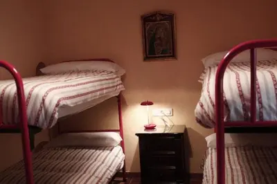 Cama o camas de una habitación en Casas Rurales La Lapa