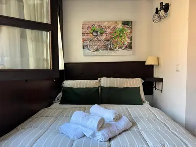 Cama o camas de una habitación en Apartamento Corredera