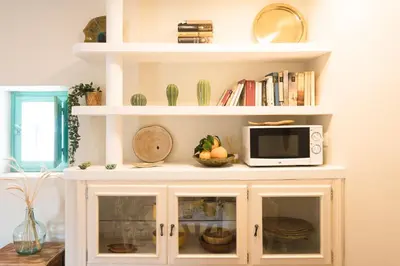 Una cocina o zona de cocina en Oasis en el centro de Sevilla