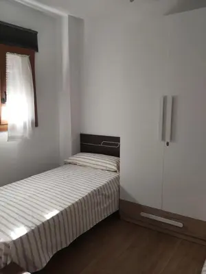 Cama o camas de una habitación en Apartamento Cuesta San Judas