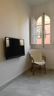 Una televisión o centro de entretenimiento en Apartamento Almirante Hoyos IV