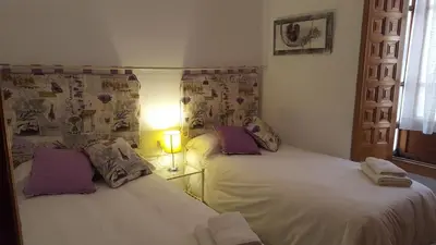 Cama o camas de una habitación en Casa Típica Cordobesa