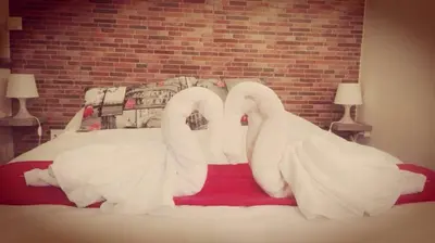 Cama o camas de una habitación en Apartamentos Gadi Corral Siglo XVI